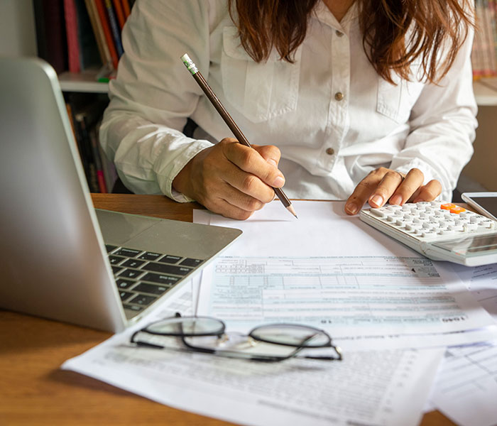 Young woman planning budget